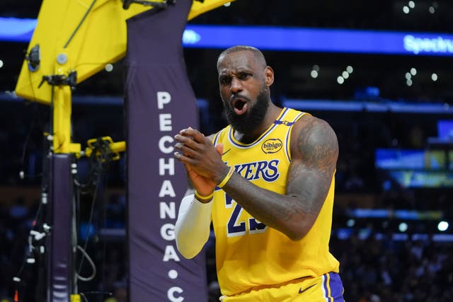 LeBron James reached the milestone with a three-pointer in the first quarter (Jae C. Hong/AP)