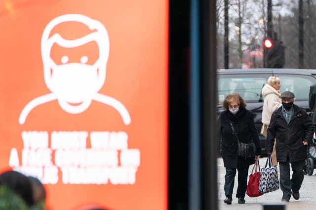 <p>Shoppers wearing face masks in London’s Oxford Street during the Covid pandemic
</p>