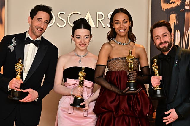 <p>Adrien Brody, Mikey Madison, Zoe Saldana and Kieran Culkin with their Oscars</p>