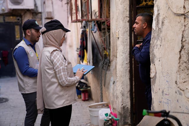 <p>Workers prepare to collect information from the public as Iraq began its first nationwide population census in decades</p>