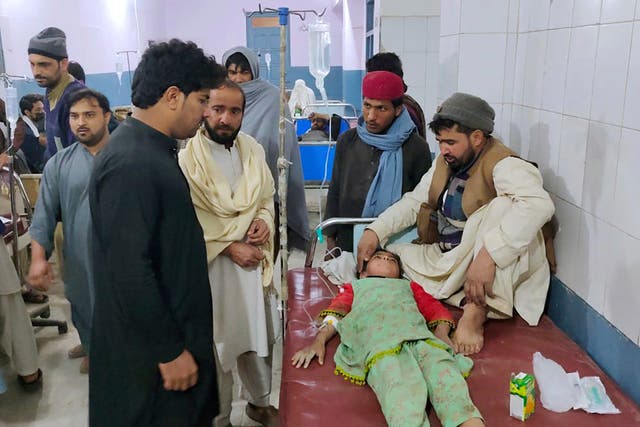 <p>A girl injured in a suicide bombing in Pakistan’s Bannu is treated in hospital</p>