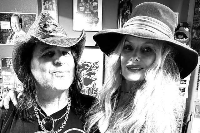 <p>Faster Pussycat frontman Taime Downe and fiancée Kimberly Burch in an Instagram post from Valentine's Day 2025.</p>
