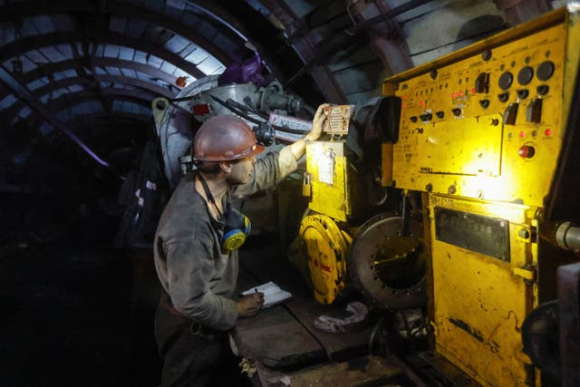 <p>A miner works at the Komsomolets of Donbas coal mine in the settlement of Kirovskoye (Khrestivka) in the Donetsk region</p>