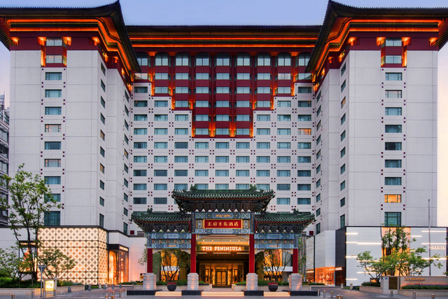 <p>A traditional Chinese gate greets guests at the hotel entrance</p>